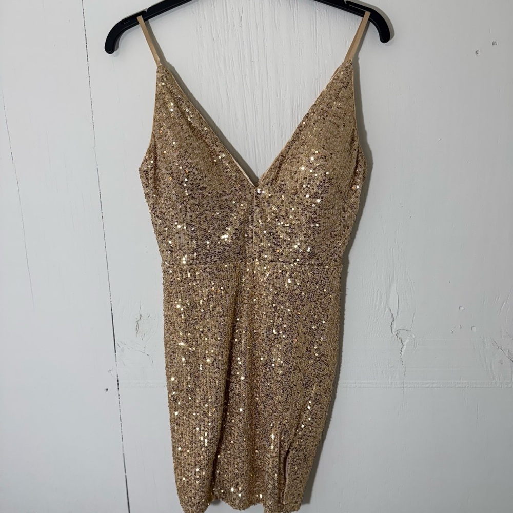 A cute sparkling gold dress.